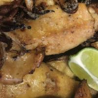 Combinacion Plate · Grilled skirt steak with the option of calamari, shrimp or octopus, served with plantain, yu...