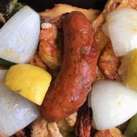 Parillada Angela Plate · Grilled sirloin, grilled chicken breast, al ajillo grilled shrimp, sausage, potato, grilled ...