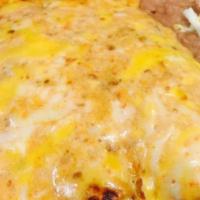 Entomatadas · Creamy enchiladas with your choice of meat, topped with cheese and a creamy tomato sauce, se...