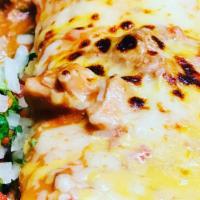 Pancho Villa · Jumbo flour tortilla stuffed with beans, chile verde pork, and ground beef, topped with chil...