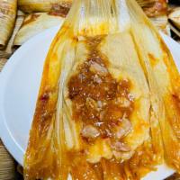 Homemade Tamales · Two tamales, made with fresh stone-ground corn masa, filled with Acapulco's special pork mea...