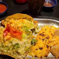 Mexican Platter · One cheese enchilada, one beef taco, and one bean tostada, served with beans or rice and you...
