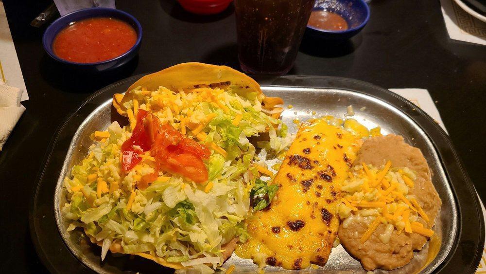 Mexican Platter · One cheese enchilada, one beef taco, and one bean tostada, served with beans or rice and your choice of corn or flour shell.