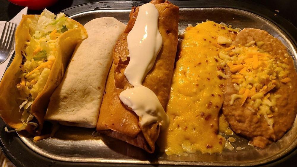 Jalisco Special · One pork burrito, one ham flauta, one beef taco, and one cheese enchilada, served with beans or rice and your choice of corn or flour shell.