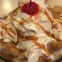 Fried Ice Cream · A scoop of French Vanilla ice cream rolled in a crispy coating, deep fried then served in a ...