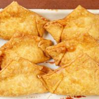 Crab Rangoon 6 Pcs) · Deep fried combination of cream cheese and crabmeat.