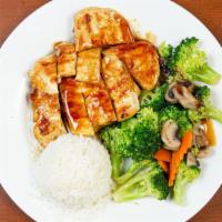 Chicken Teriyaki · Pan fried chicken white meat, broccoli, fresh mushroom, carrot, drizzled with teriyaki sauce...