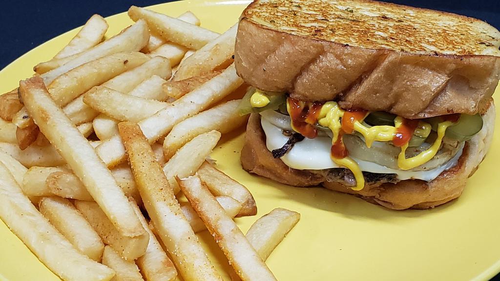 Texas  Gourmet Burger · Double Decker Burger, grilled onion, swiss cheese, mustard, pickle on a garlic Texas toast