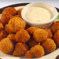 Breaded Mushrooms · Half pound. Served with ranch dressing.
