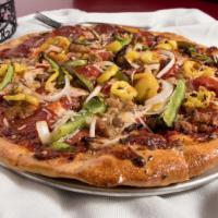 Deluxe · Marinara sauce, pepperoni, spicy sausage, green and banana peppers, diced onions, provolone,...