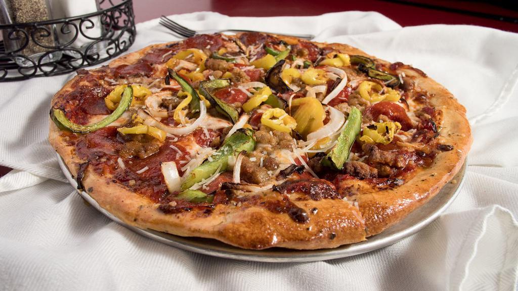 Deluxe · Marinara sauce, pepperoni, spicy sausage, green and banana peppers, diced onions, provolone, mozzarella, parmesan, herbs.