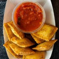 Cheese Toasted Ravioli (10 Pcs) · Cooked to perfection with mozzarella, ricotta, romano, and parmesan cheese.