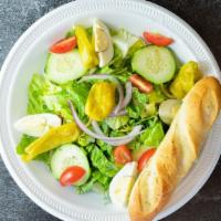 Garden Salad · Hearts of romaine, tomato, sweet red onion, cucumber, boiled egg, and pepperoncini. Served w...