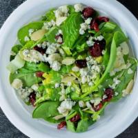 Very Berry Almond Salad · Spring mixed leaves salad with cranberries and sliced almonds. Topped with crumbled bleu che...