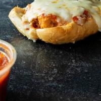 Chicken Parmigiana Sandwich · Juicy chicken breast breaded and fried, covered with marinara, and baked with mozzarella.