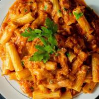 Pasta With Meat Sauce · Pasta served with ground beef tomato sauce.