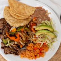 Fajitas · Sauteed with onions, green pepper and tomato. Side of lettuce and tomato served with rice. A...