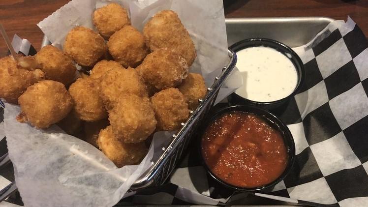 Hot Pepper Cheese Bites · Pepper jack cheese balls breaded and deep fried. Served with ranch.