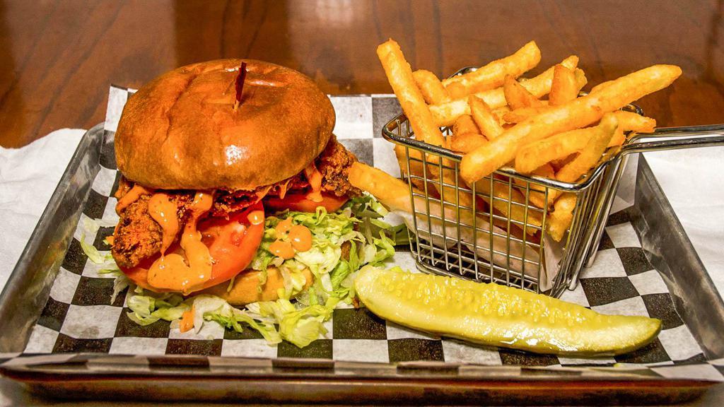 The Mahoney · The King of the fried chicken sandwich, extra crispy, buttermilk fried chicken breast on a brioche bun, tossed in Cajun seasoning and topped with lettuce, tomato, onion, lots of pickle chips and chipotle mayo.