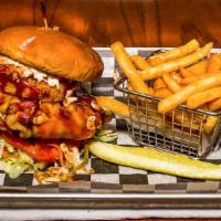 Cj’S Southern Burger · Topped with pulled pork, bacon, cheddar cheese, coleslaw, onion ring, and our smoky BBQ sauc...