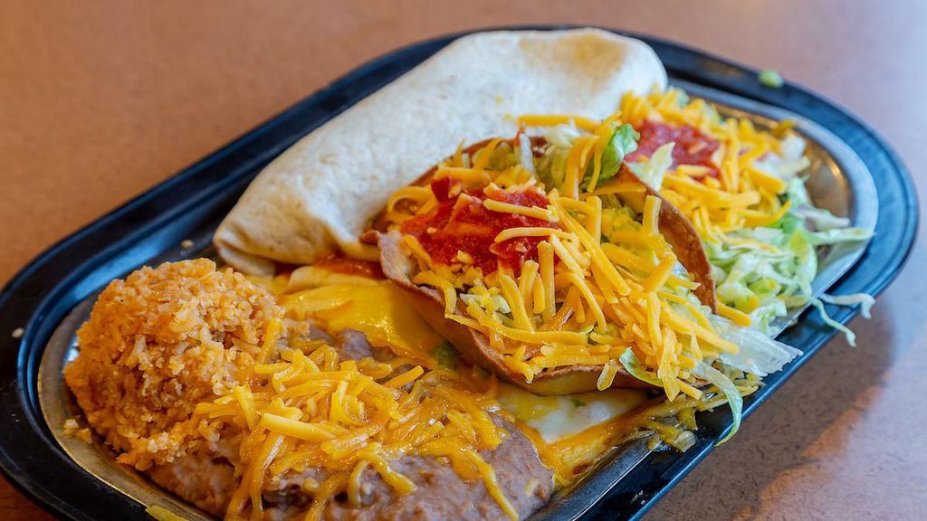 Mexican Combination Plate 2 · One cheese enchilada, one beef taco, one bean tostada and one pork burrito, served with beans, rice and your choice of corn or flour shell.