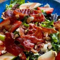 Strawberry Salad · Field greens, fresh strawberries, crispy bacon, crisp green apples, queso fresco cheese, can...