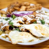 Chilaquiles Verdes · Strip tortilla  with Salsa Verde topped  with Cilantro,Onios & Sour cream. Served with 2 egg...