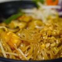 Pad Thai · Thin rice noodles, bean sprout, scallion, egg, crushed peanut in tamarind sauce.
