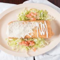 Chimichanga Burrito · Deep Fried Burrito topped with Melted Cheese and Sour Cream. Includes: Beans, Cheese, Lettuc...