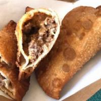 Beef Empanada · Puerto Rican style ground beef empanada sold individually. 

Approximately 1/3 pound each