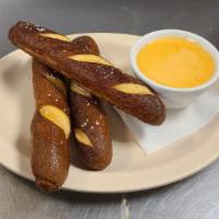 Bavarian Pretzel Sticks & Cheese · Hot Bavarian pretzel sticks served with our special beer and cheese dip.