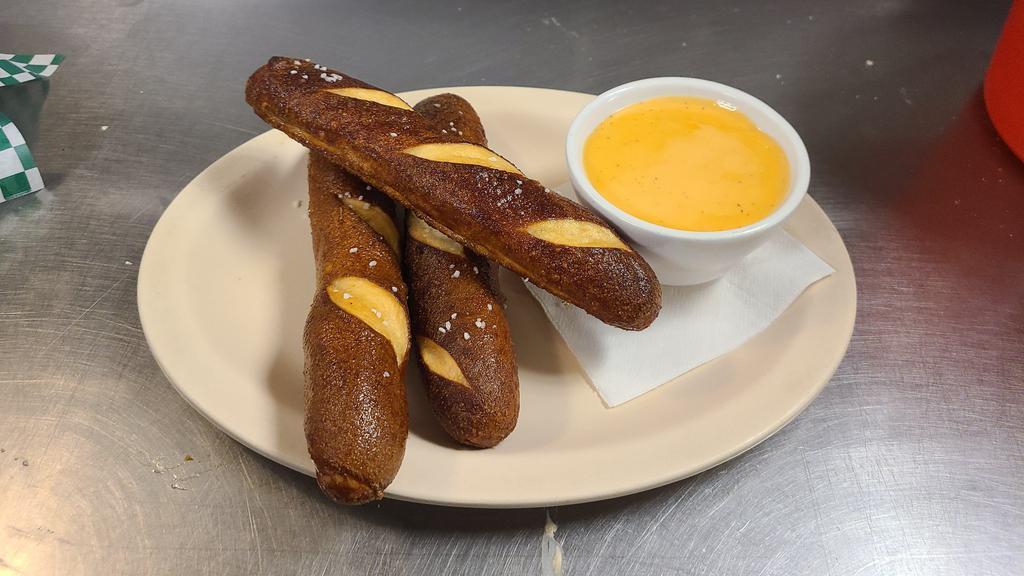 Bavarian Pretzel Sticks & Cheese · Hot Bavarian pretzel sticks served with our special beer and cheese dip.