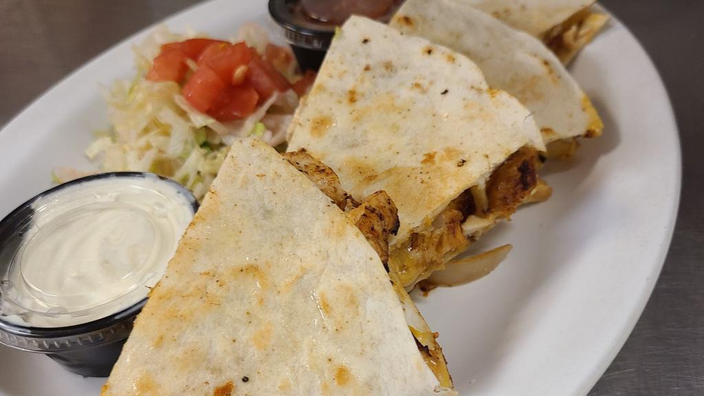 Chicken Quesadilla · Grilled chicken, mixed cheese, sautéed onions in a grilled tortilla. Served with lettuce, tomato, sour cream & salsa on the side.