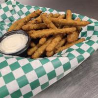 Dublin Green Beans · Lightly battered green beans, flash fried and served with ranch dipping dressing.