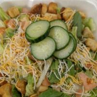 Tavern Tossed Salad · Fresh chopped romaine, cucumbers, tomato, croutons and mixed cheese.