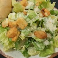 Classic Caesar Salad · Fresh chopped romaine lettuce, croutons, parmesan cheese and Caesar dressing.
