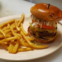 Bbq Burger · Fresh 1/2 pound patty topped with smoked bacon, cheddar, fried onions, lettuce, tomato, and ...