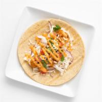 Shrimp Tacos · Deliciously marinated shrimp, cilantro lime slaw, tomato, and chihuahua cheese served on whi...