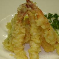 Shrimp Tempura Appetizer · Three shrimps and vegetables lightly fried.