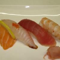 Sushi Sampler · Salmon sea bass, tuna, shrimp.