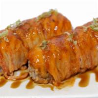 Special Dynamite Roll · shrimp tempura roll with crab stick and eel sauce on top. grilled
