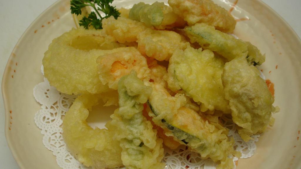 Shrimp Tempura · Sevan shrimp and vegetables lightly fried.