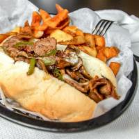 Philly Steak · Fresh grilled steak, onion, green peppers, mushrooms, mozzarella, provolone, served on a Cub...