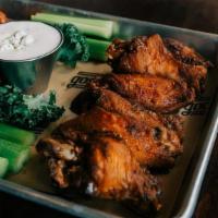 Twelve Wings · beer brined chicken wings, celery, buttermilk ranch, tossed in Goodwood infused hot sauces