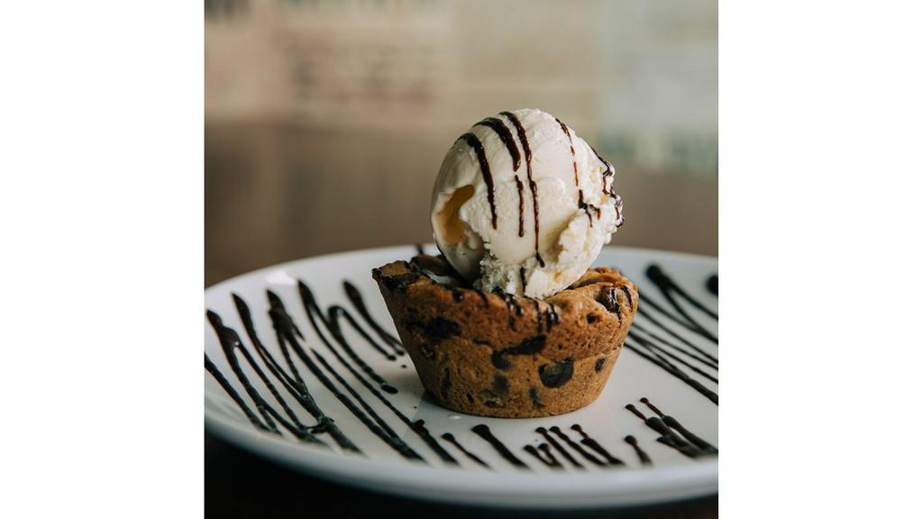 Chocolate Chip Lava Cookie · molten chocolate chip cookie, served warm with vanilla ice cream