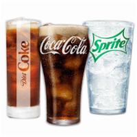 Drink (Quart - 32Oz) · Refreshing Coca-Cola products served in a Pizza King branded plastic cup