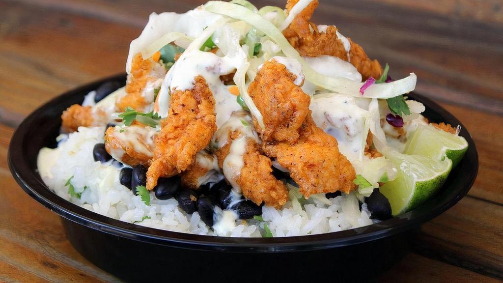 #10 Fried Chicken Bowl · Topped with hand battered chicken breast with jalapeno ranch, slaw and cilantro.