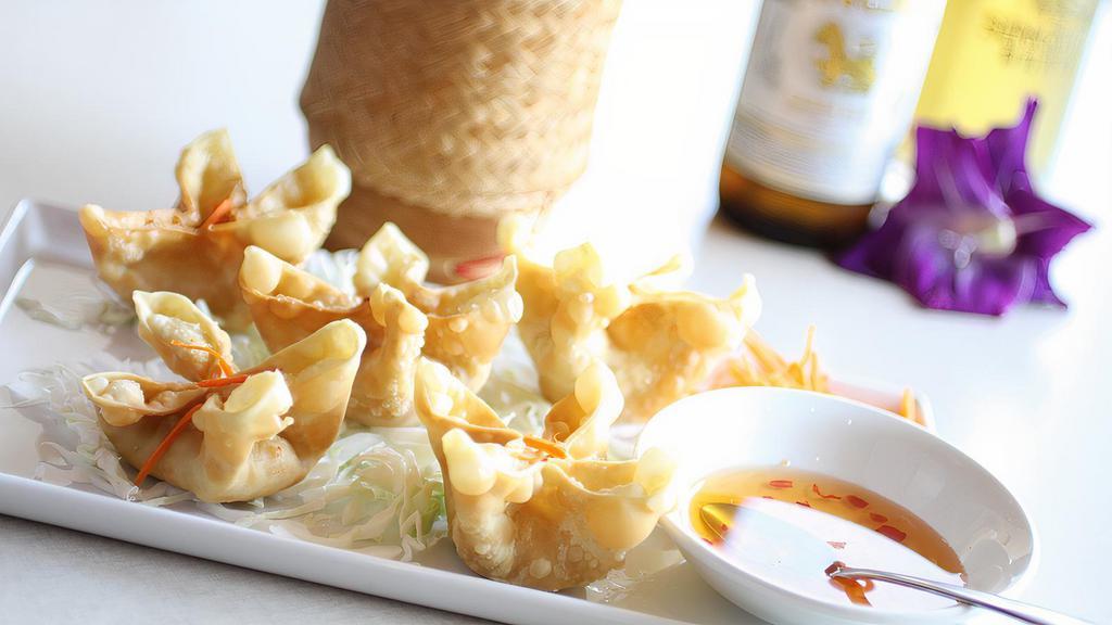 8 Pieces Of Crab Rangoon · Cream cheese, mixed with our homemade sauce and wrapped in wonton skin, deep-fried and served with our sweet and sour sauce.