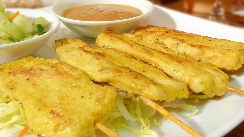 4 Pieces Of Chicken Satay · Chicken tenders marinated on skewers then grilled and served with our delicious peanut sauce and cucumber salad sauce.