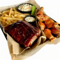 Rib/Wing Combo Dinner · 1/2 rack of ribs w/sauce choice, 1/2 dozen wings w/sauce choice, and choice of 2 sides